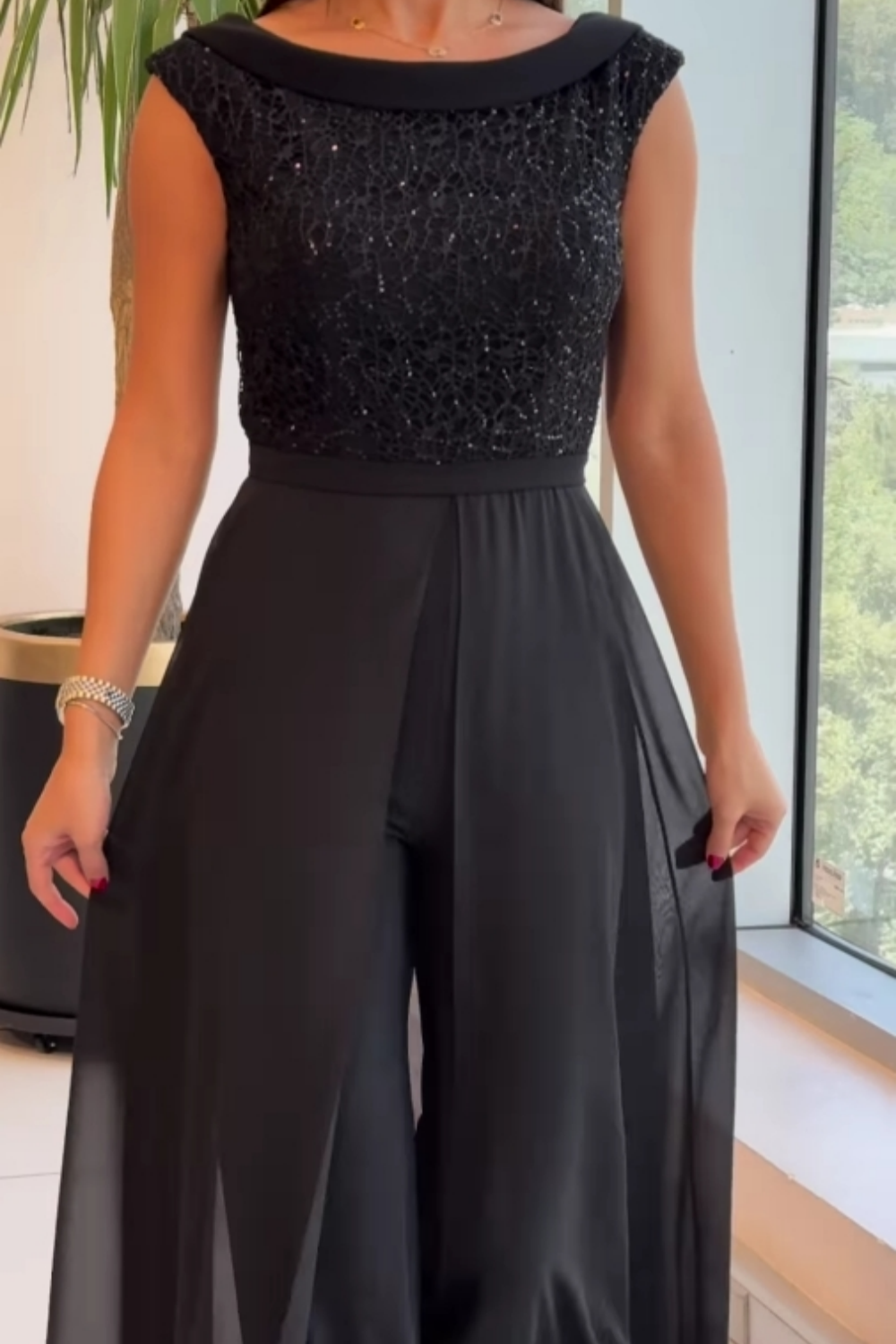 Elegante mouwloze jumpsuit met textuur – Stijlvol en veelzijdig