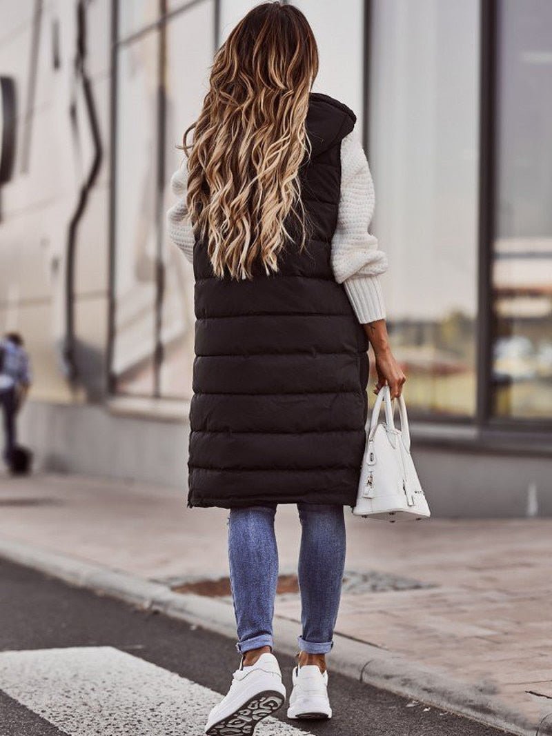 Lange Gewatteerde Damesbodywarmer Merava – Stijlvolle Knielange Wintervest met Rits en Capuchon