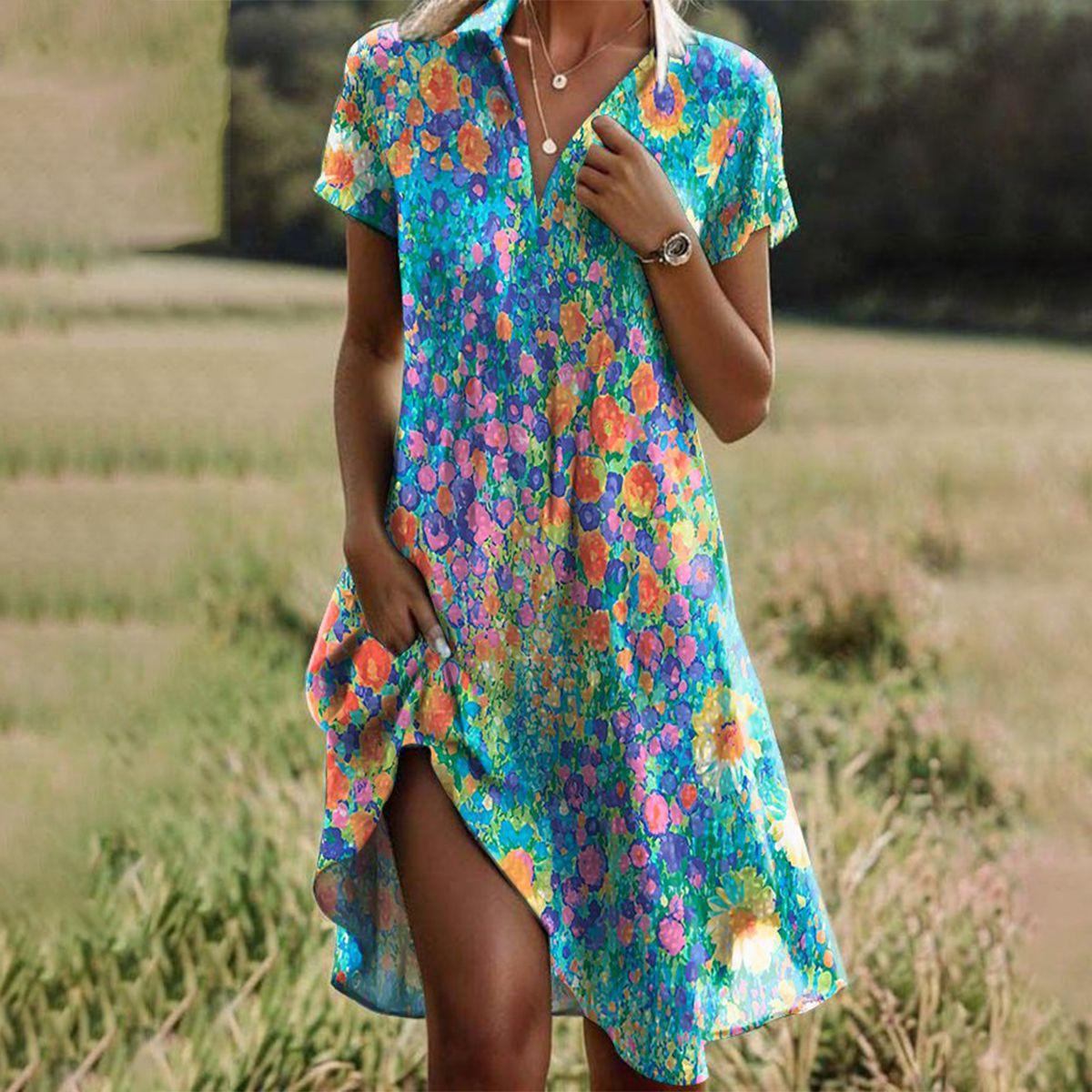 Bohojurk Fleuriva – Luchtige Zomerjurk met Bloemenprint en Asymmetrische Zoom