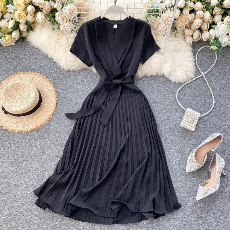 Eleganza Plissé Midi Jurk Met V-Hals