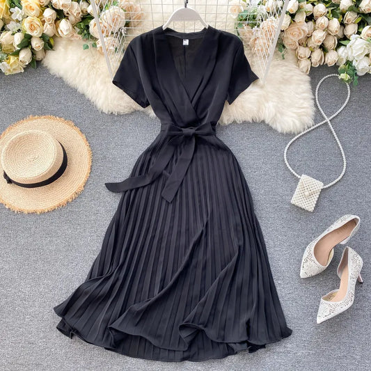 Eleganza Plissé Midi Jurk Met V-Hals