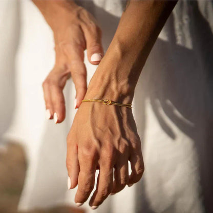 Minimalistische Knoop Armband van Roestvrij Staal - Zilver en Goud