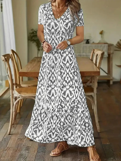 BreezeLuxe Flowy Zomerjurk met V-Hals en Opgerolde Mouwen