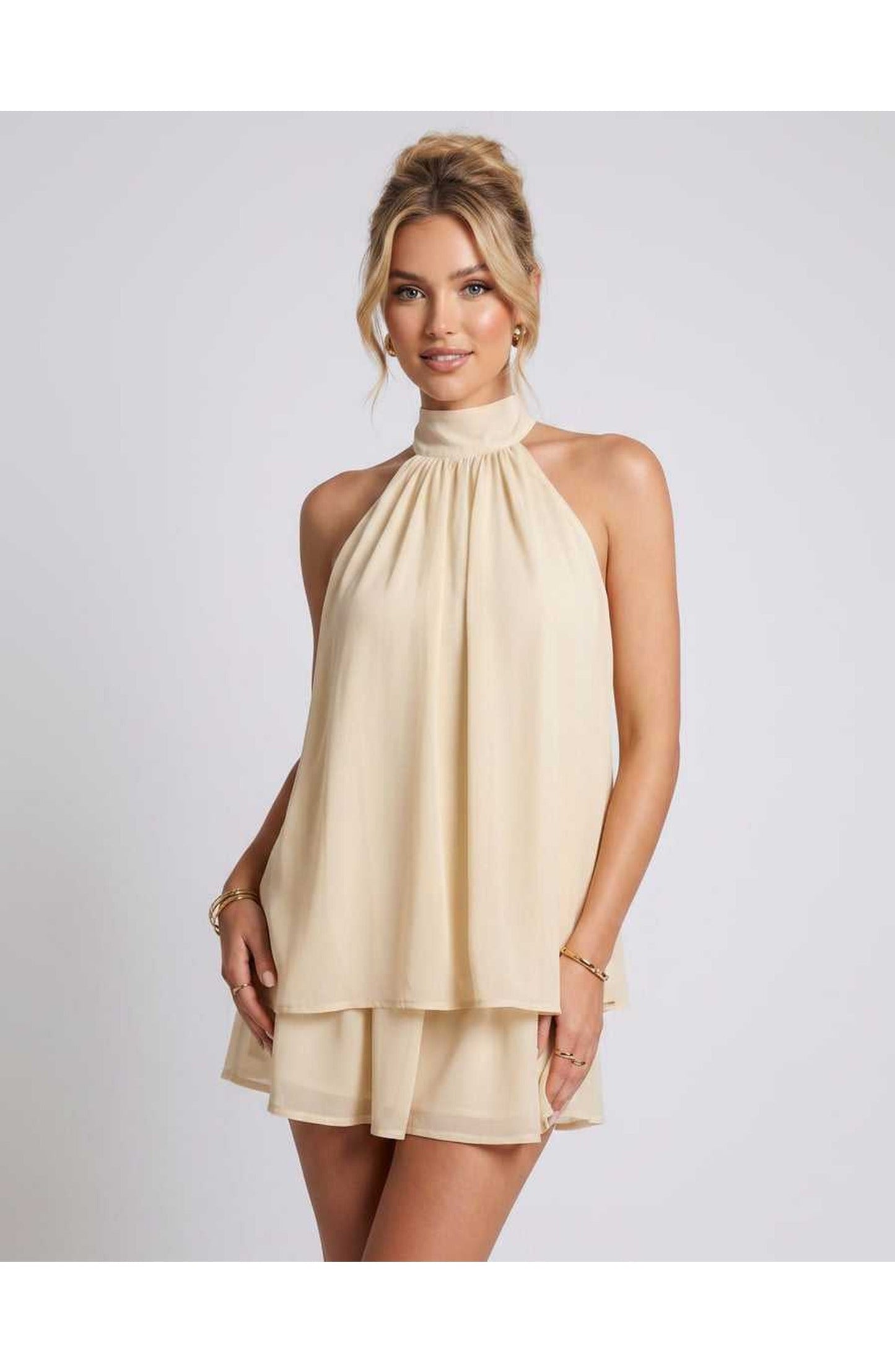 ZomerFlair Mini Jurk met Halterneck en Gelaagde Rok