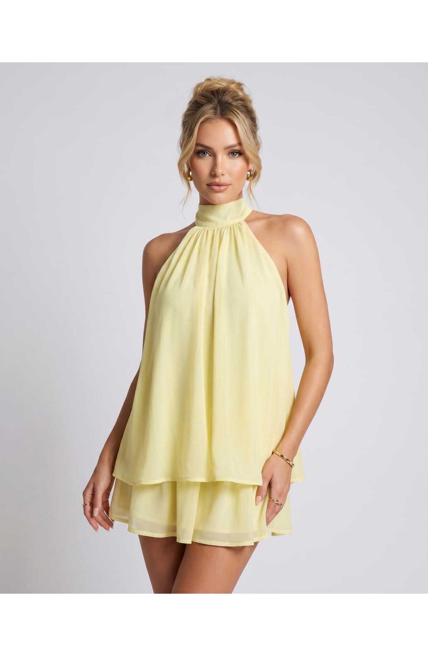 ZomerFlair Mini Jurk met Halterneck en Gelaagde Rok