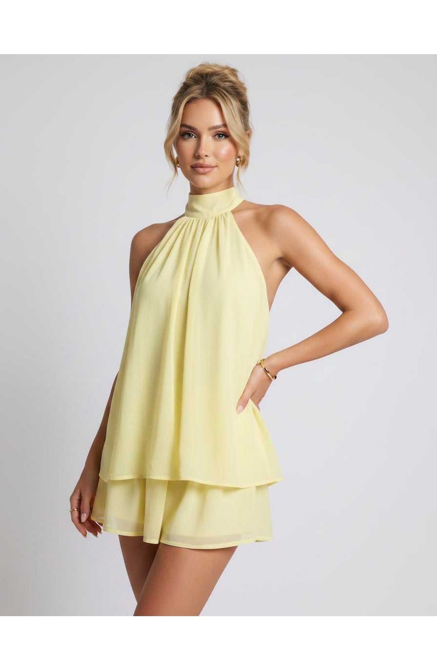 ZomerFlair Mini Jurk met Halterneck en Gelaagde Rok