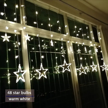 Sterren LED-gordijnslinger warm wit – feestelijke verlichting voor binnen en buiten