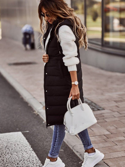 Lange Gewatteerde Damesbodywarmer Merava – Stijlvolle Knielange Wintervest met Rits en Capuchon