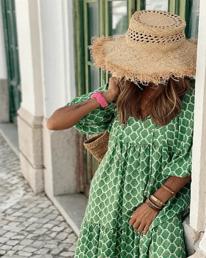 Zomergloed bohemian damesjurk – lange groene zomerjurk met print en V-hals