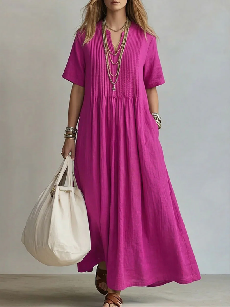 Elegante geplooide zomerjurk met vloeiend design