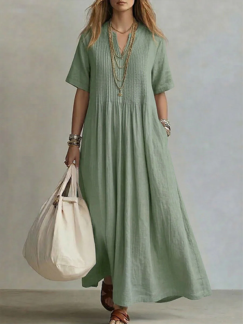 Elegante geplooide zomerjurk met vloeiend design