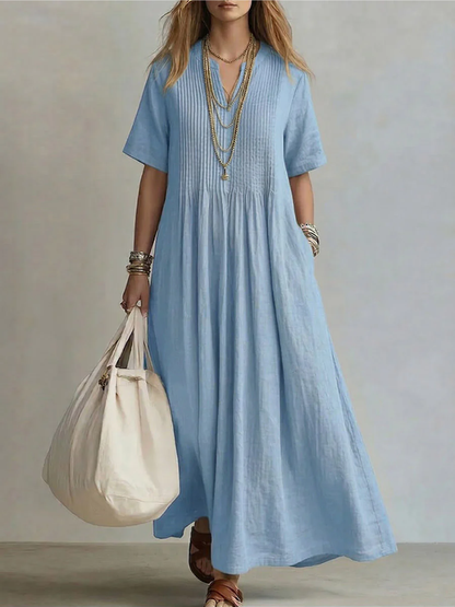 Elegante geplooide zomerjurk met vloeiend design