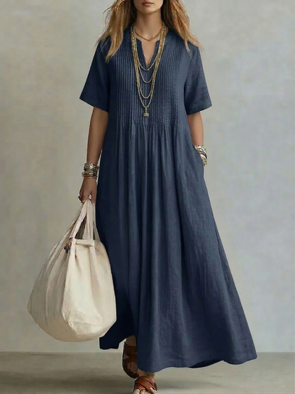 Elegante geplooide zomerjurk met vloeiend design