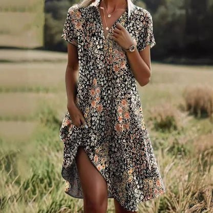 Bohojurk Fleuriva – Luchtige Zomerjurk met Bloemenprint en Asymmetrische Zoom