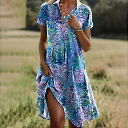 Bohojurk Fleuriva – Luchtige Zomerjurk met Bloemenprint en Asymmetrische Zoom